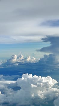 Vertical blue sky white cloudscape natural background layout 