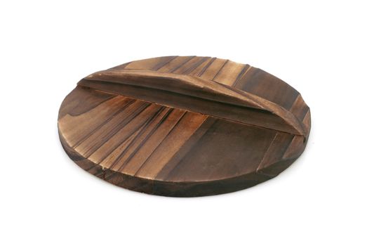 wooden cover of the bowl on white background