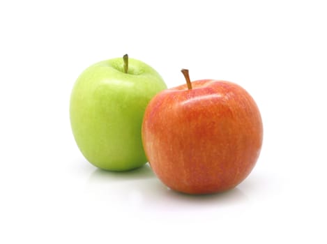 One red apple and one green apple on white background