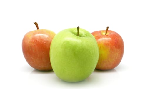 Two red apples and one green apple on white background