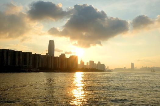 Hong Kong Victoria River and buildings at sunset