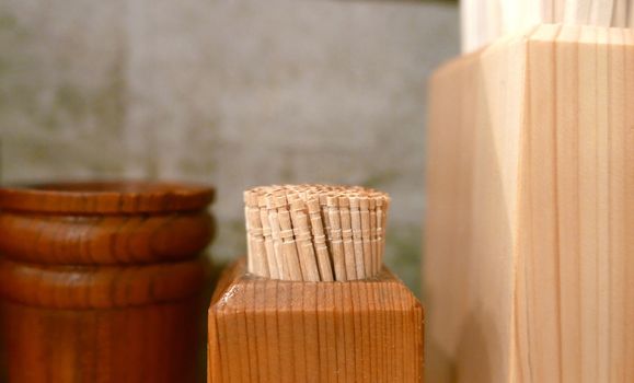 The box of toothpicks and chopsticks