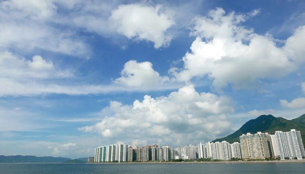 Hong Kong residential buildings cityscape, cloudscape and blue sky