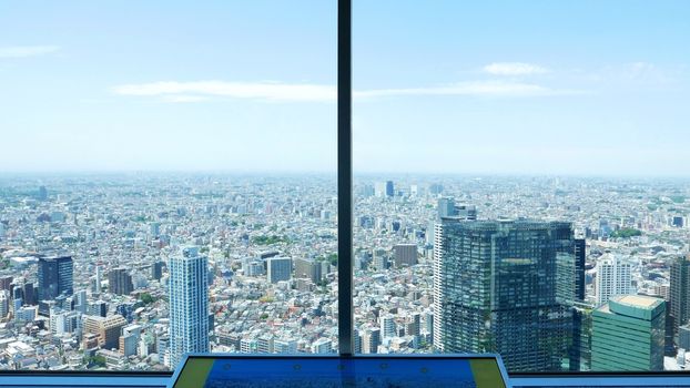 Sight seeing Japan from tall building's window