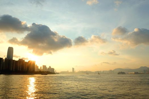 Hong Kong Victoria River and buildings at sunset