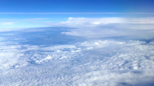 Nice natural clouds in the blue sky from aerial view