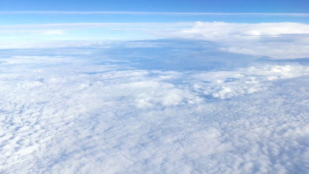 Nice natural clouds in the blue sky from aerial view