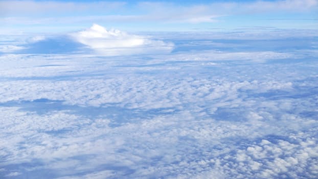 Nice natural clouds in the blue sky from aerial view