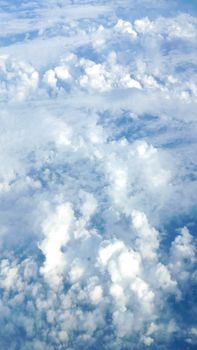 Nice natural clouds in the blue sky from aerial view