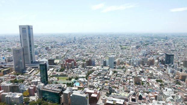 Japan Tokyo cityscape, commercial and residential building, road aerial view