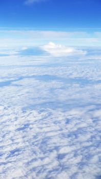 Nice natural clouds in the blue sky from aerial view