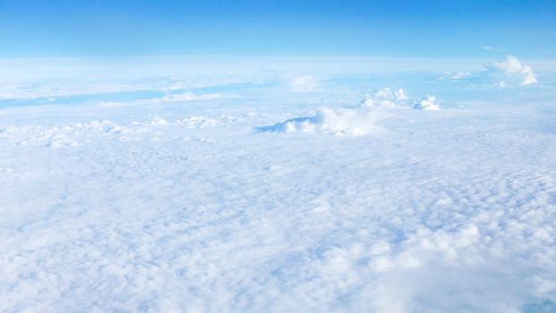 Nice natural clouds in the blue sky from aerial view