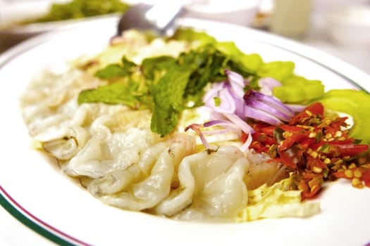 Thailand food raw shrimp and some vegetables on the white dish