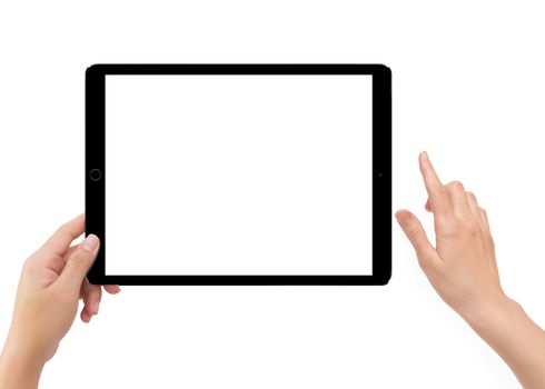 Isolated human left hand holding black tablet computer white screen mockup on white background