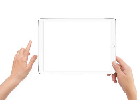 Isolated human right hand holding white tablet computer white screen mockup on white background