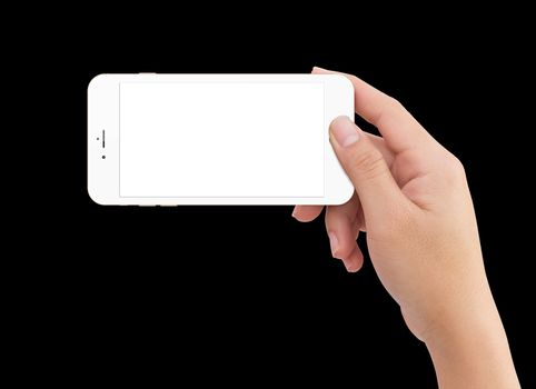 Isolated human right hand holding white mobile smart phone mockup on black background