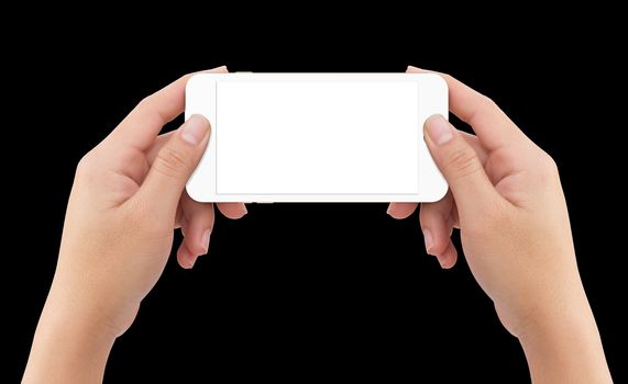 Isolated human two hands holding white mobile smart phone mockup on black background