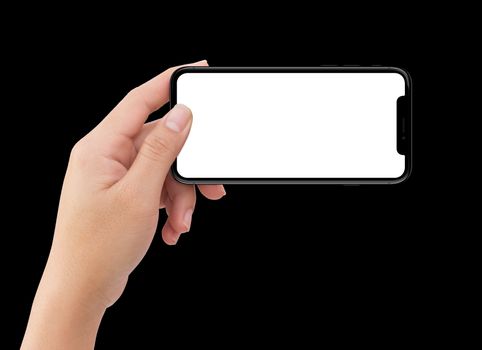 Isolated human left hand holding black mobile smart phone mockup on white background