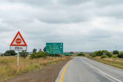 Landscape on road S463 at the junction with the N5 near Winburg. Several road signs are visible