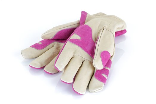 A pair of pink garden gloves isolated on white background