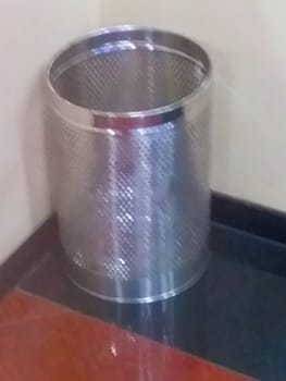 a steel garbage bin