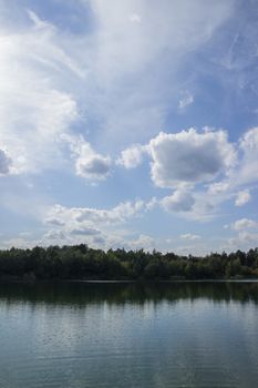 Lake in Woods. Pure lake in the forest. Beautiful sky