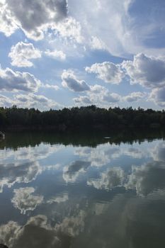 Lake in Woods. Pure lake in the forest. Beautiful sky