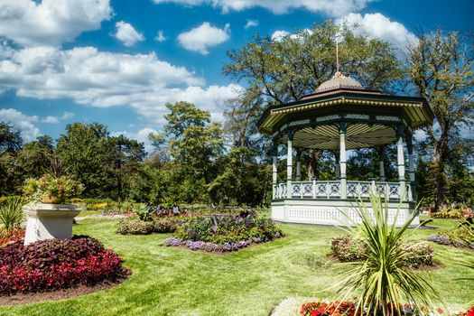 Ornate wood gazebo in a formal garden