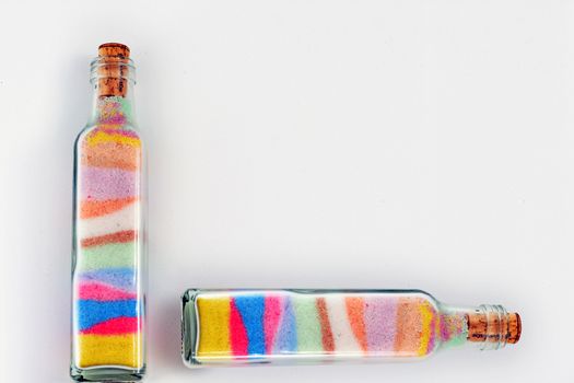 bottle background full of colored sand
