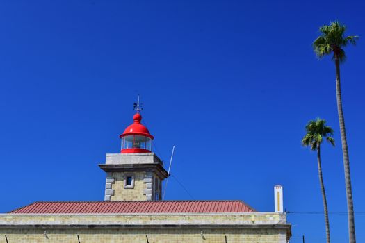 Lighthouse on cliffs of Ponta da Piedade in Portugal