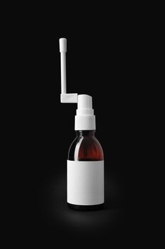Throast spray medicine isolated on black background. With clipping path