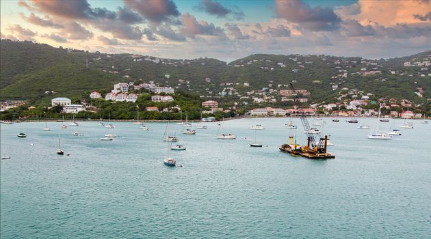 Bay in St Thomas with many moored sailboats and new pier construction