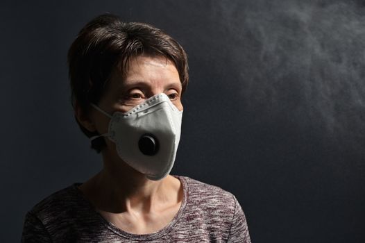 Woman Wearing Medical Protective Virus Mask on dark background