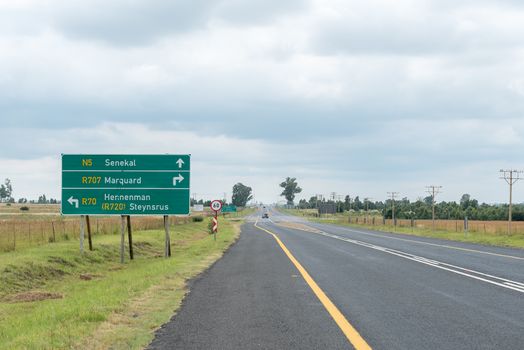 Directional and speed road signs on road N5 near Senekal in the Free State Province