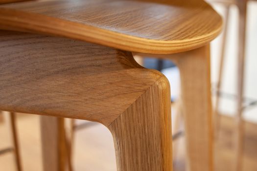 close up of wood work of a chair and table