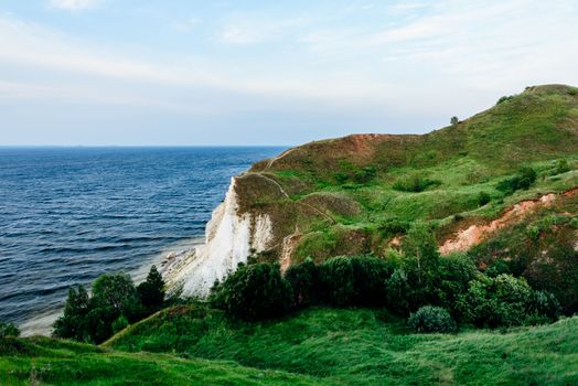 Landscape of a cliff next to the river. Lobach mountain on the Kama rivers estuary.