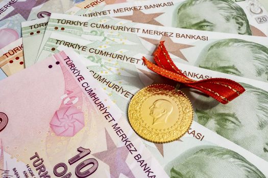 close up turkish gold coins on background