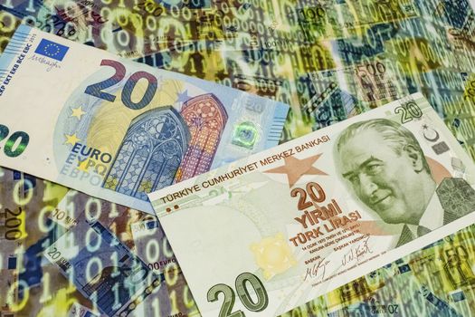 close up turkish lira banknotes with euro bankmotes on background