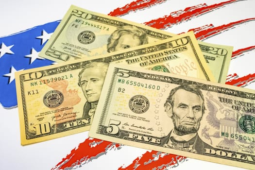 close up US dollar banknotes on background.