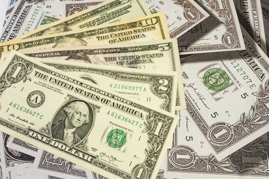 close up US dollar banknotes on background.