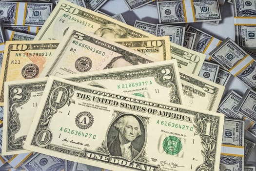 close up US dollar banknotes on background.