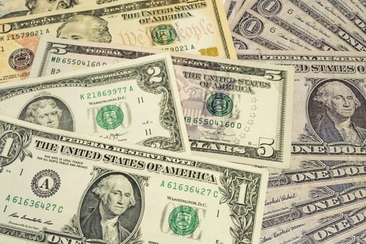 close up US dollar banknotes on background.