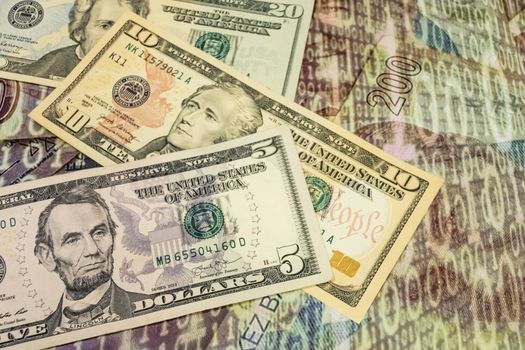 close up US dollar banknotes on background.