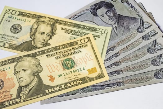 close up US dollar banknotes on background.