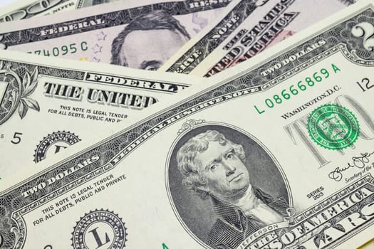 close up US dollar banknotes on background.