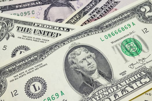 close up US dollar banknotes on background.