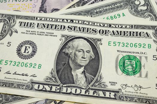 close up US dollar banknotes on background.
