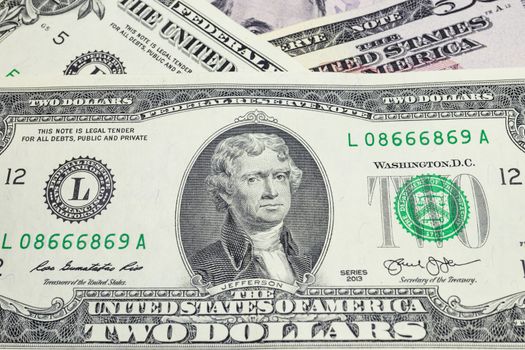 close up US dollar banknotes on background.