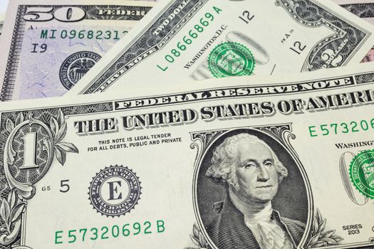 close up US dollar banknotes on background.