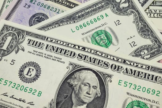 close up US dollar banknotes on background.
